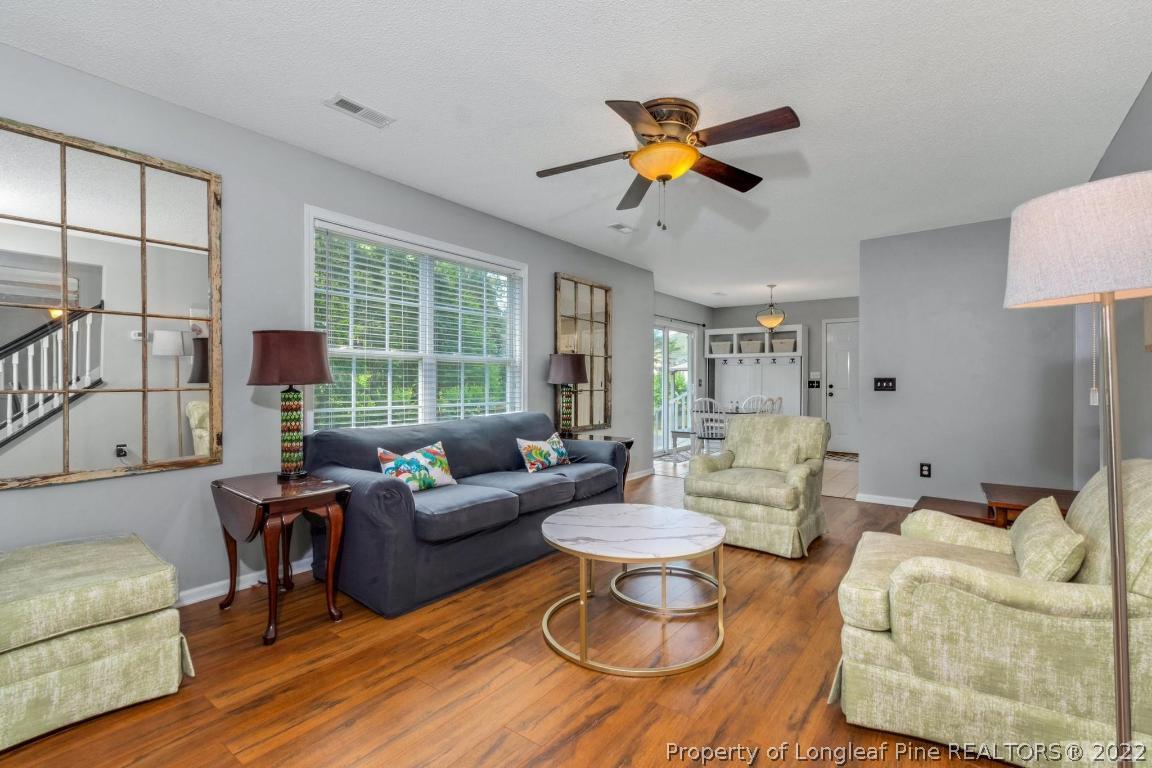 226 Linden Road Cameron, NC 28326 - Photo 9 of 36 a living room with furniture and a large window