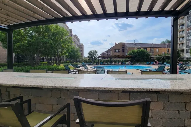 a view of outdoor space with swimming pool