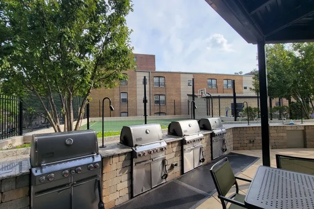 a terrace of a house with outdoor seating