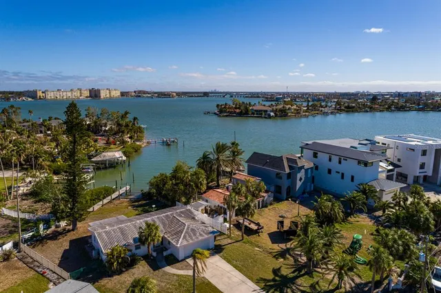 an aerial view of a house with outdoor space