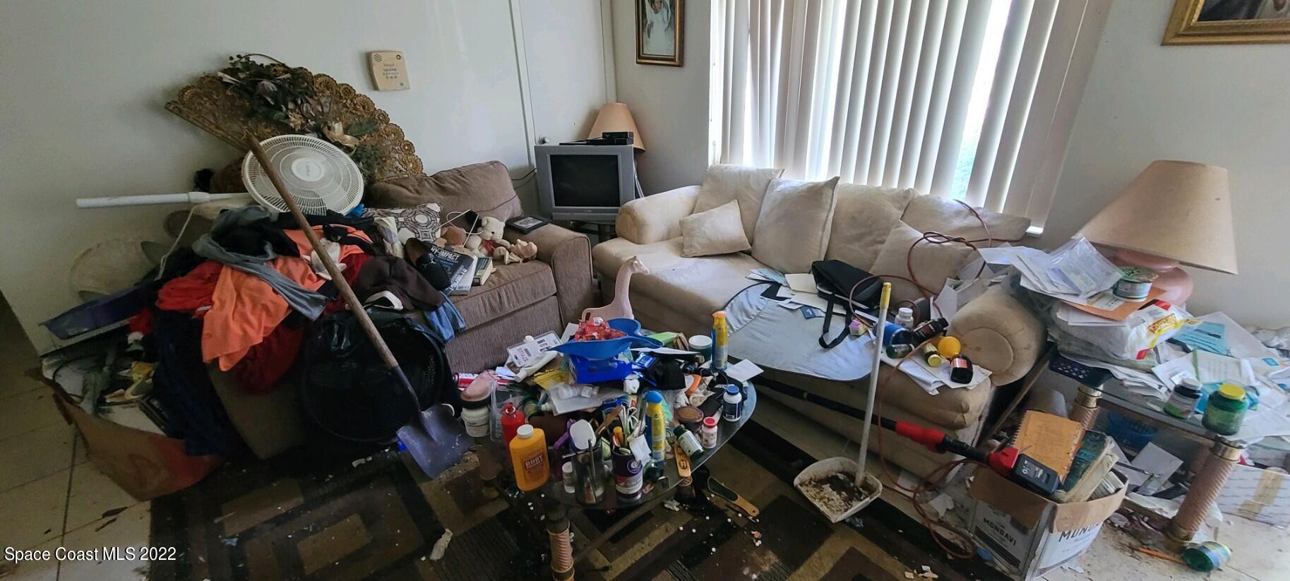 1118 Manatee Drive Rockledge, FL 32955 - Photo 2 of 8 wooden floor in a room with musical instruments