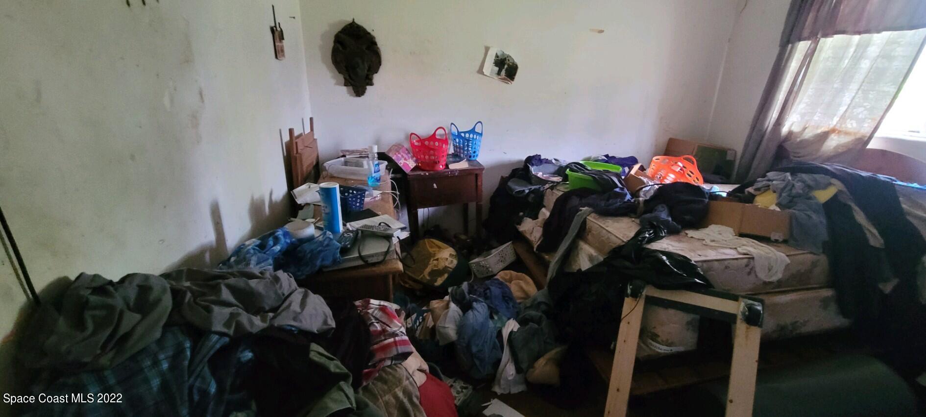 1118 Manatee Drive Rockledge, FL 32955 - Photo 5 of 8 a view of a flower