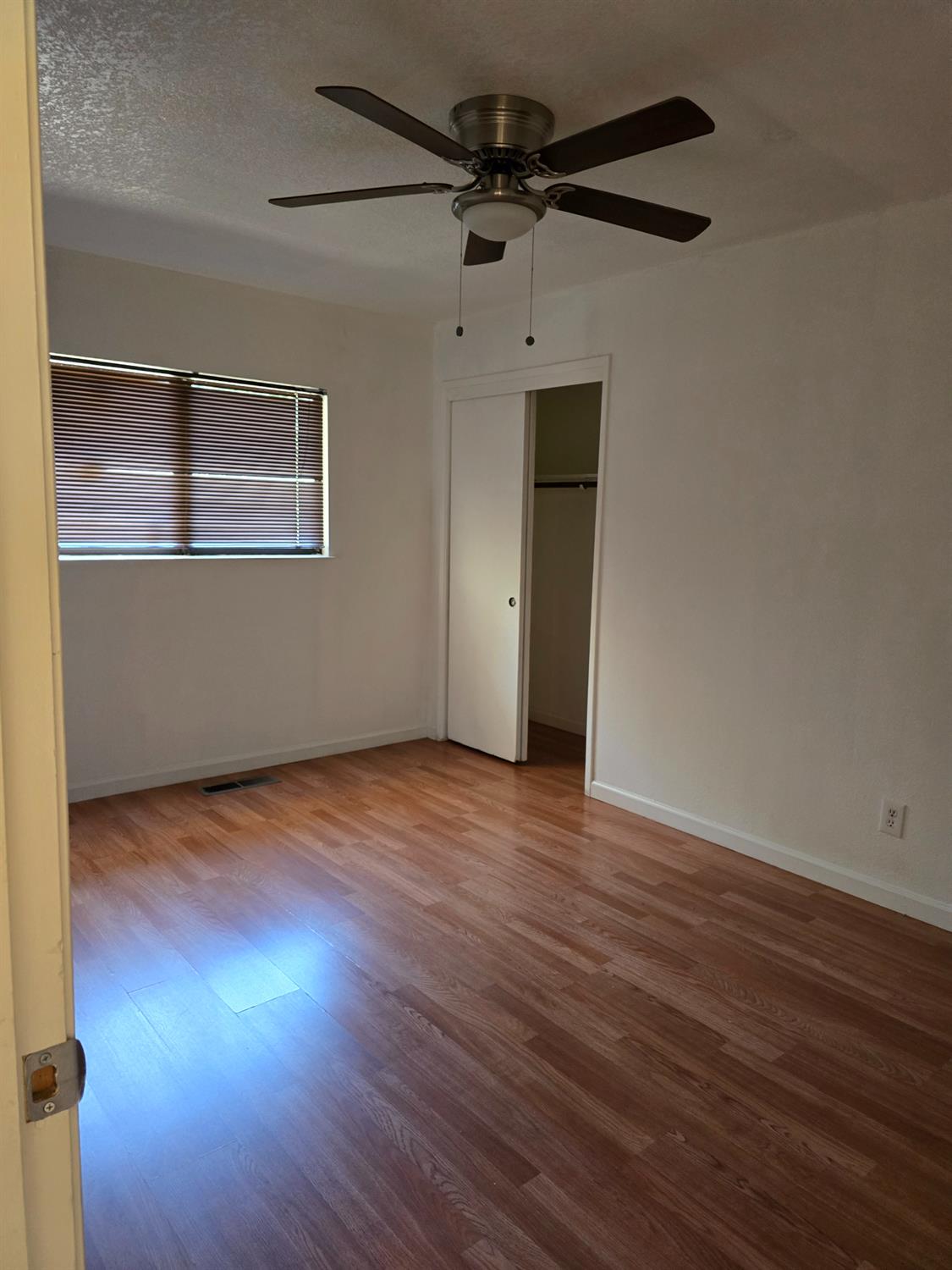 649 Sycamore Avenue Gustine, CA 95322 - Photo 5 of 12 wooden floor in an empty room
