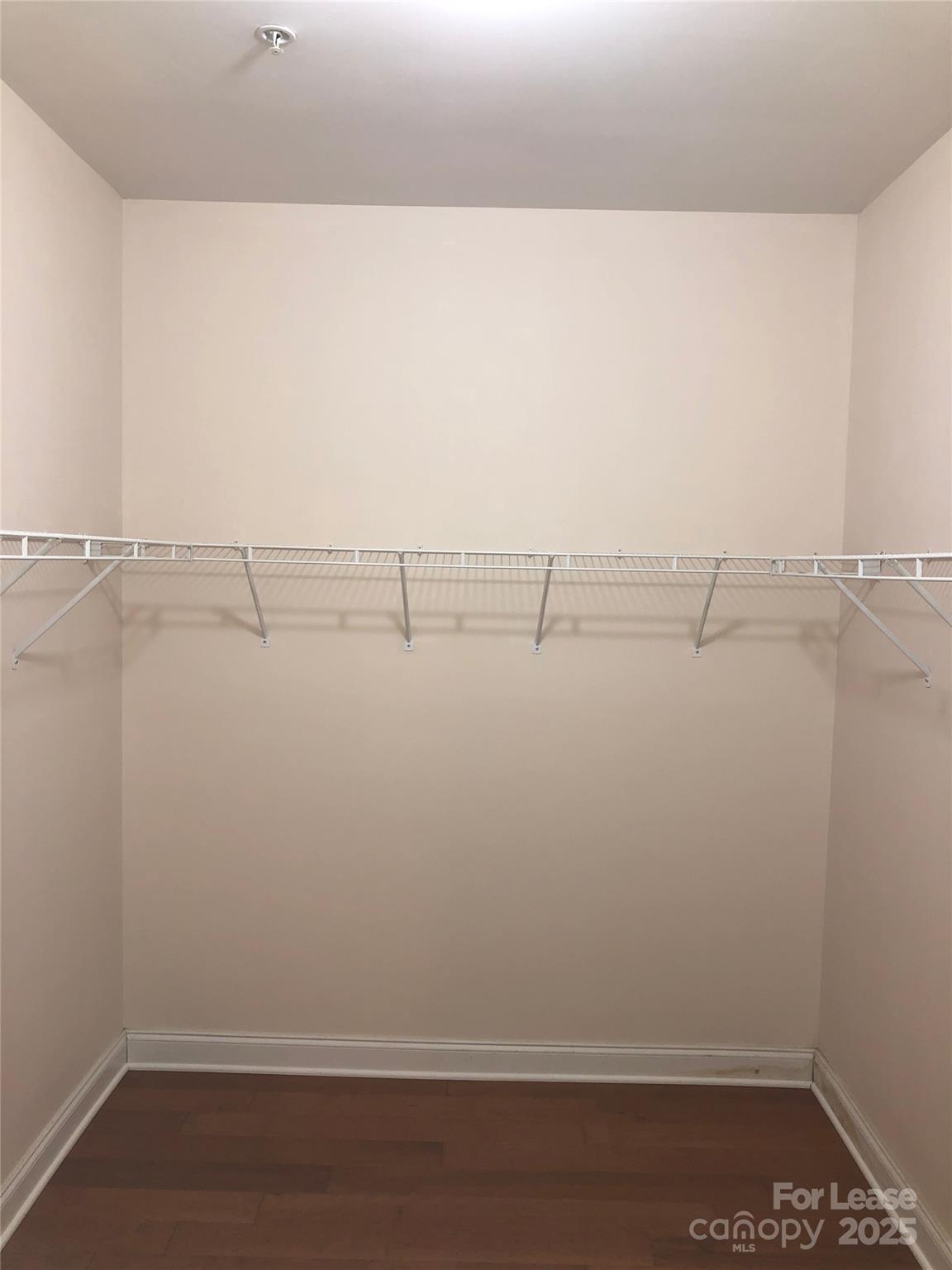 21253 Hickory Street Cornelius, NC 28031 - Photo 13 of 17 a view of a room with racks on the wall