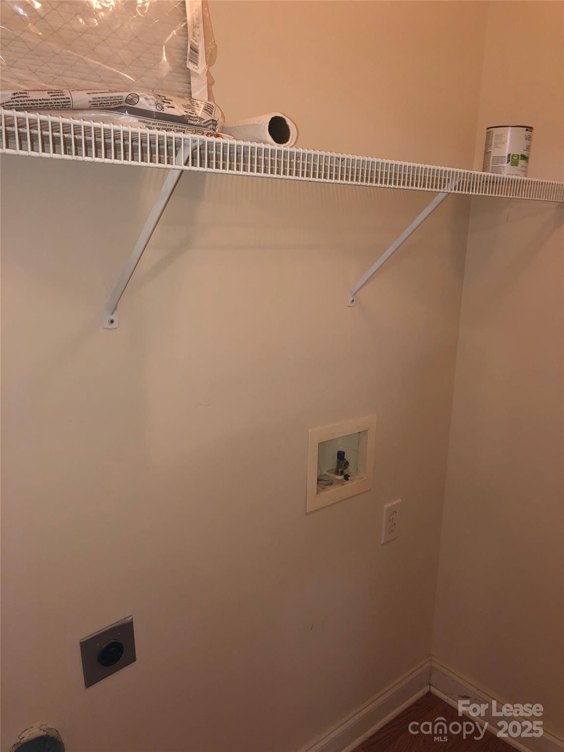 21253 Hickory Street Cornelius, NC 28031 - Photo 9 of 17 a view of a room with racks on the wall