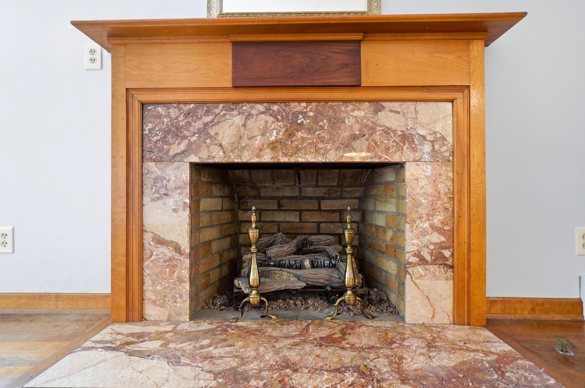 559 Enfield Road Columbus, OH 43209 - Photo 8 of 33 The fireplace is attractive focal point in the room.