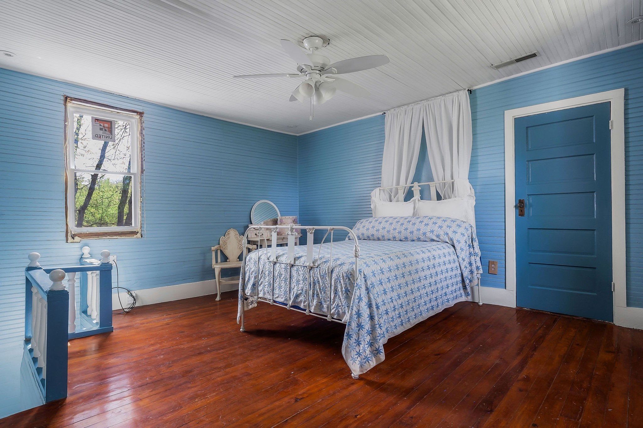 134 Opossum Hollow Road Watertown, TN 37184 - Photo 14 of 41 a bedroom with a bed and a table