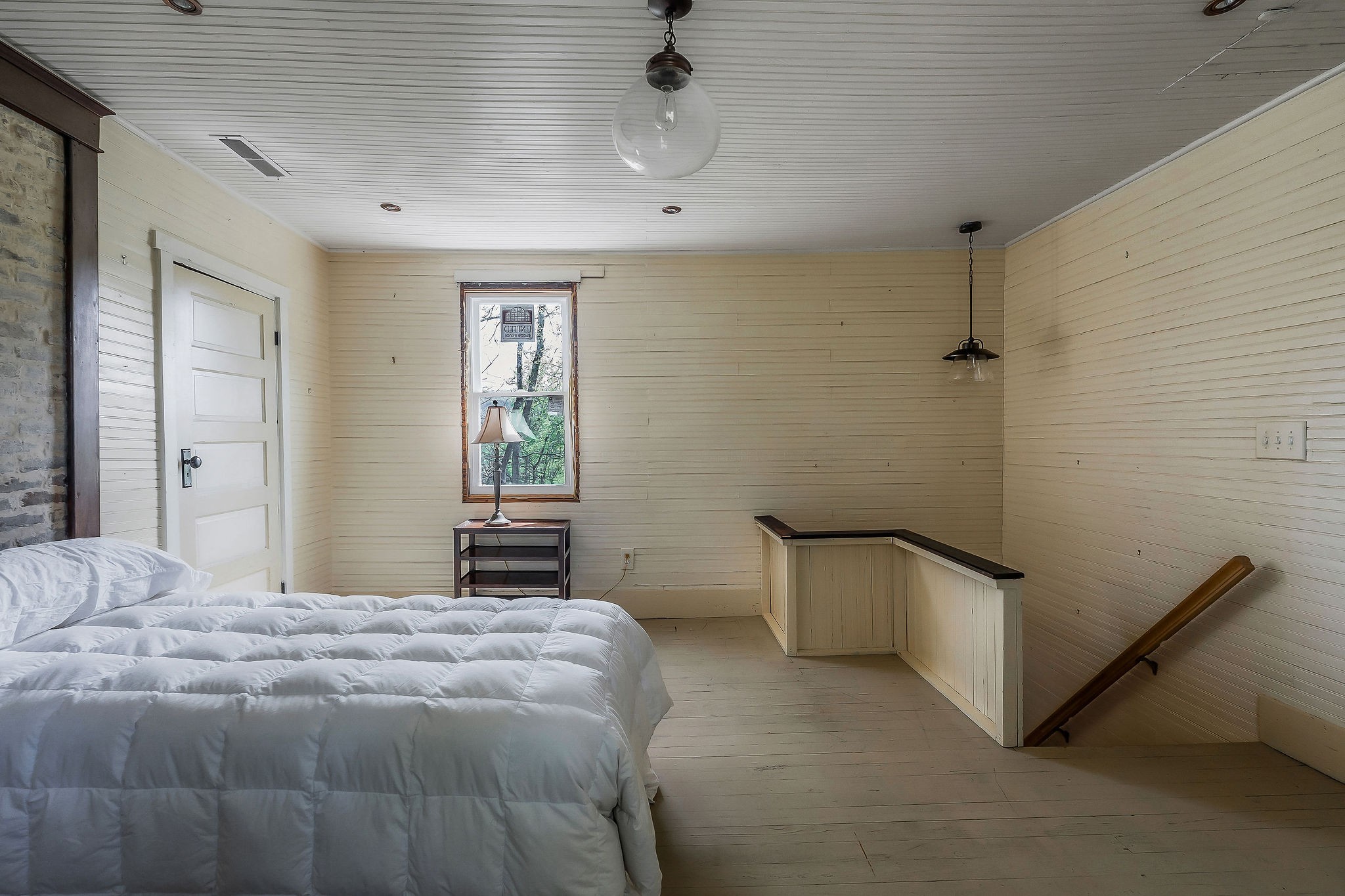 134 Opossum Hollow Road Watertown, TN 37184 - Photo 19 of 41 a bedroom with a bed and window