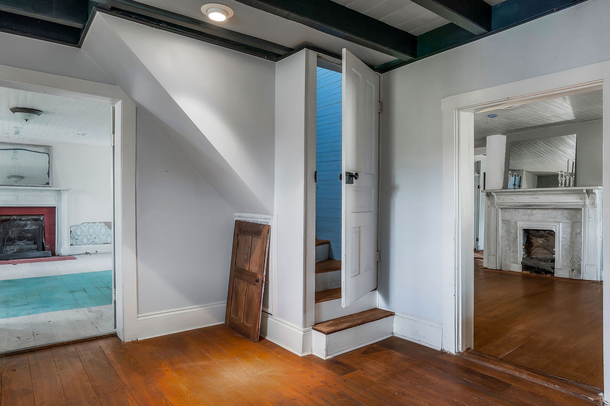 134 Opossum Hollow Road Watertown, TN 37184 - Photo 21 of 41 a view of a livingroom with wooden floor and a fireplace