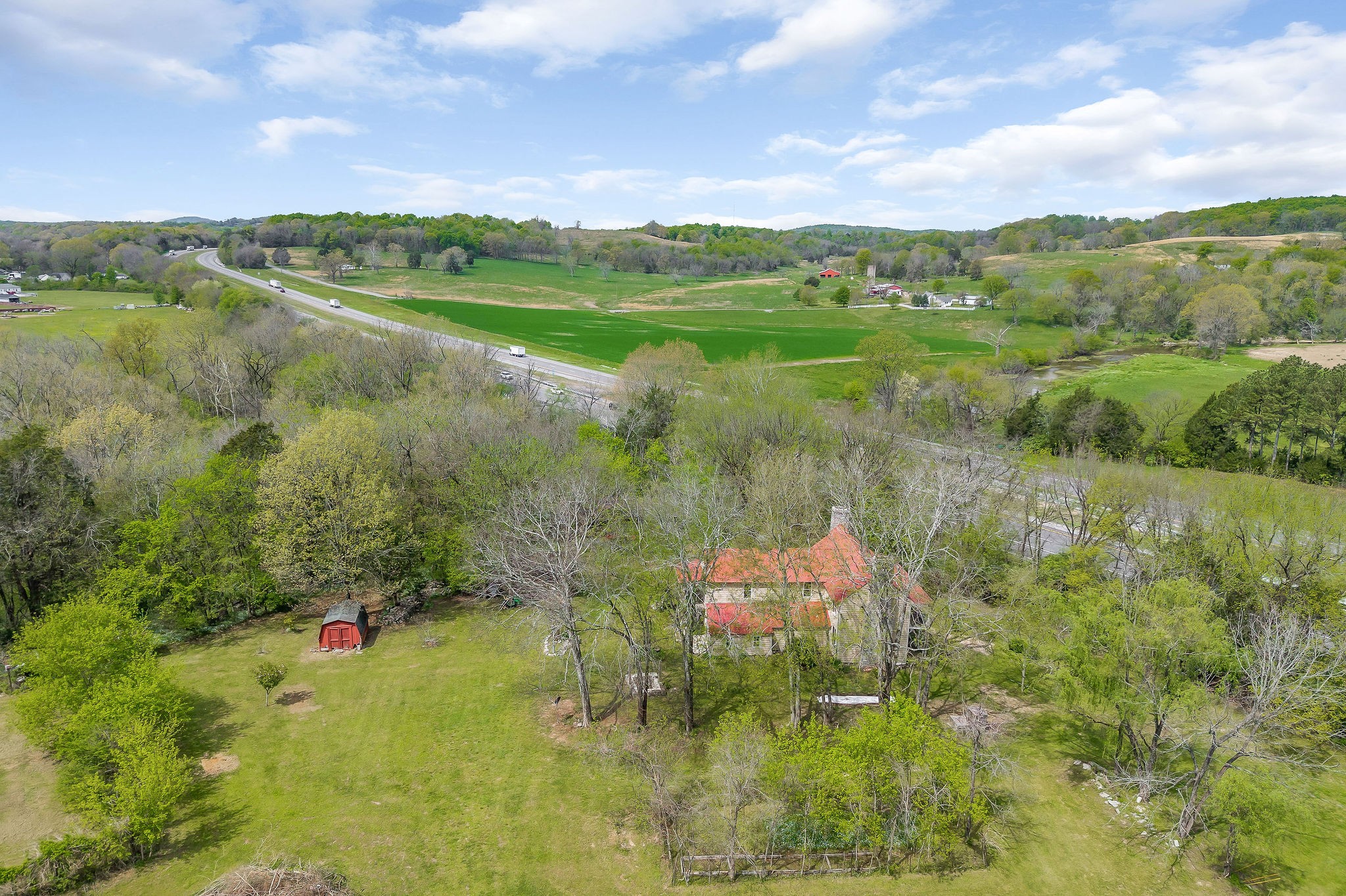 134 Opossum Hollow Road Watertown, TN 37184 - Photo 40 of 41 a view of a lake with a yard
