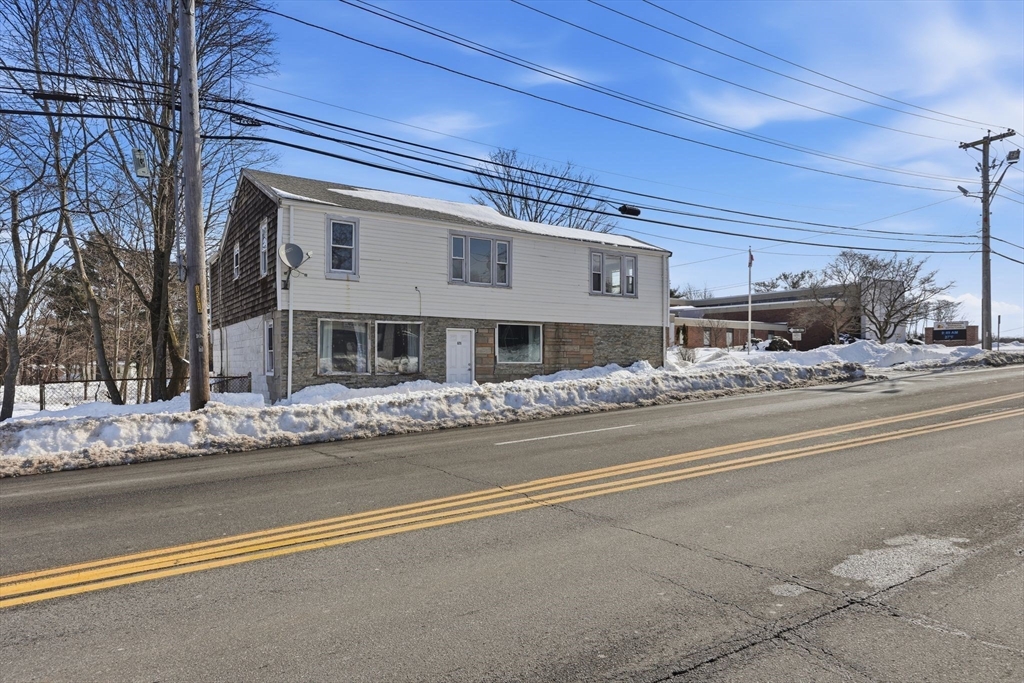 875 North Main Street Randolph, MA 02368 - Photo 2 of 42 a front view of a house with a ocean view