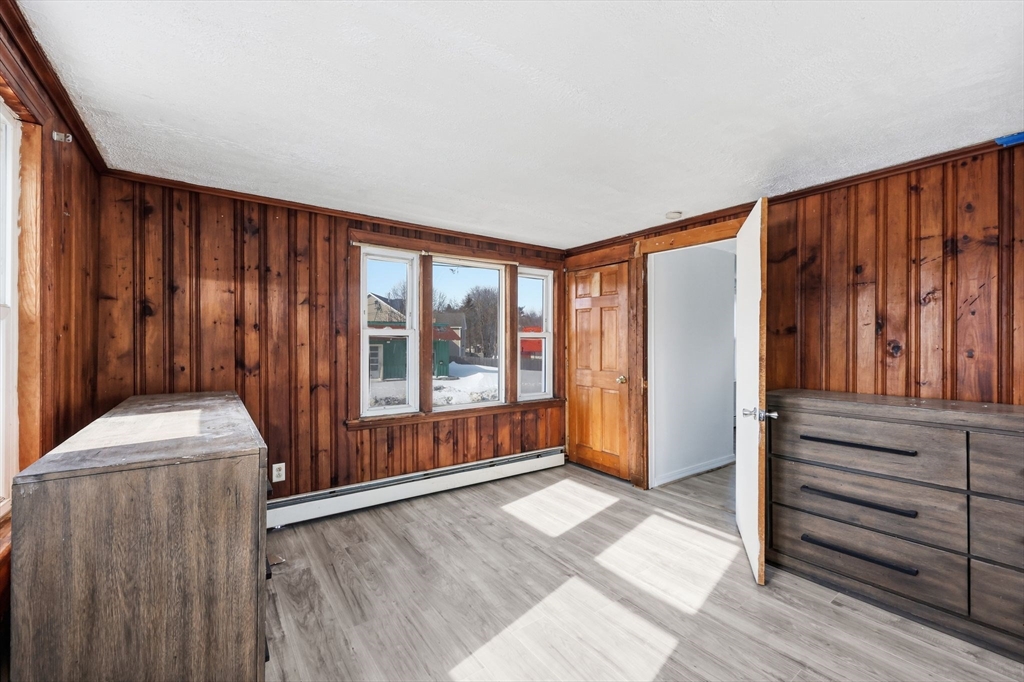 875 North Main Street Randolph, MA 02368 - Photo 33 of 42 a view of front door with wooden floor and door