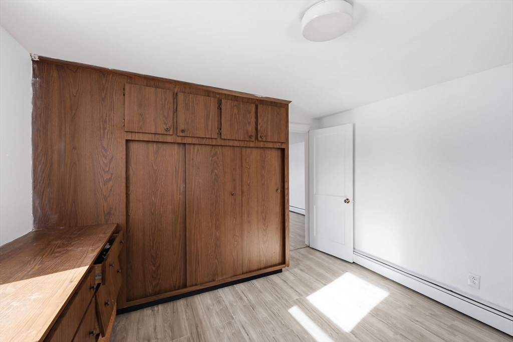875 North Main Street Randolph, MA 02368 - Photo 35 of 42 a view of a kitchen with wooden floor