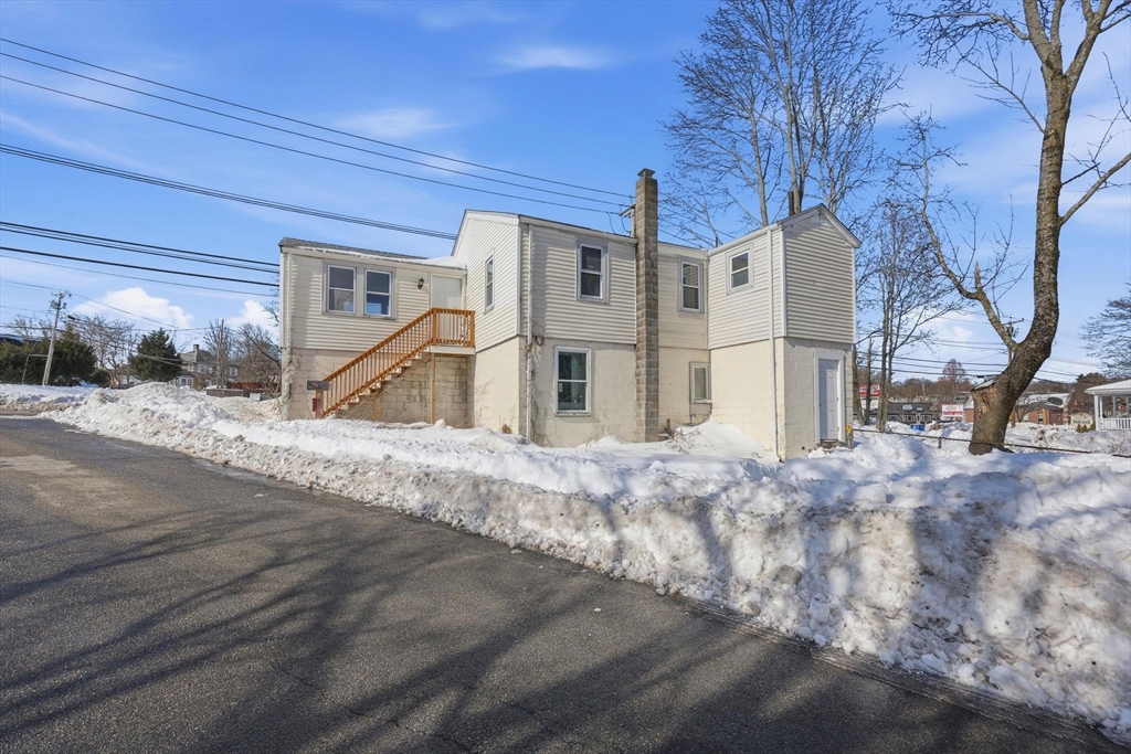 875 North Main Street Randolph, MA 02368 - Photo 40 of 42 a view of a house with a yard