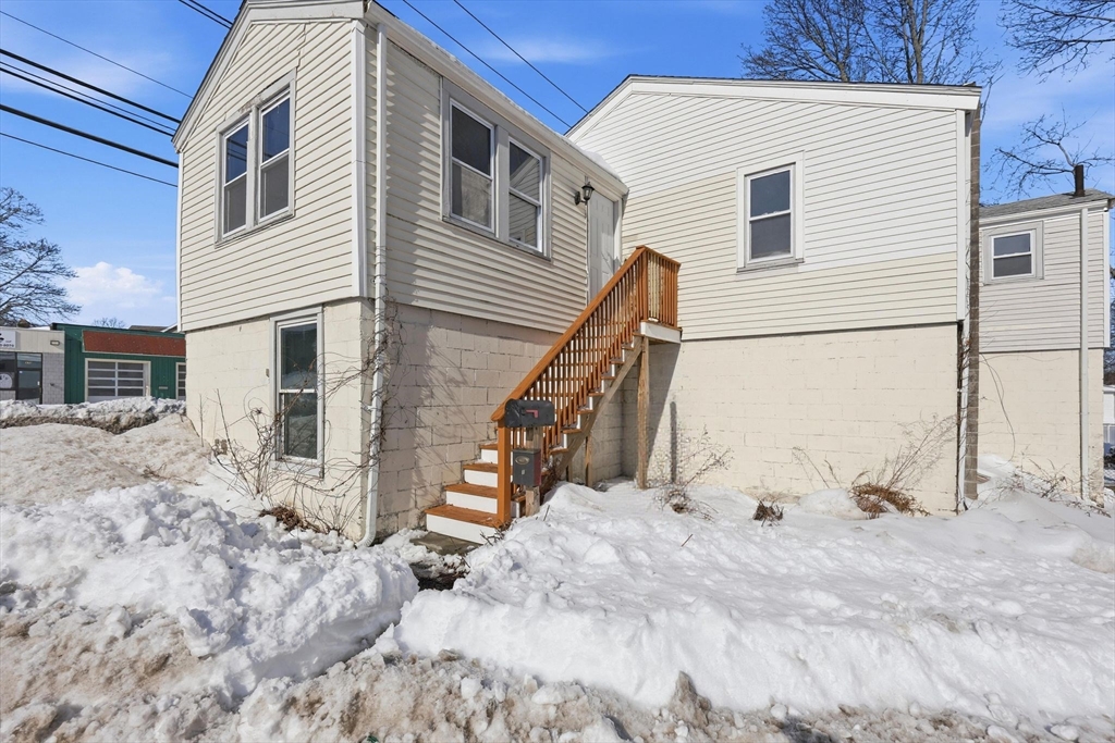 875 North Main Street Randolph, MA 02368 - Photo 41 of 42 a view of a house with a snow