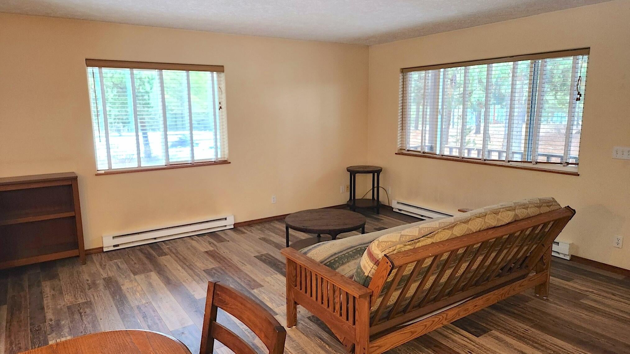16545 Sprague Loop La Pine, OR 97739 - Photo 10 of 45 UPDATED PIC-New wood laminate flooring in great room/hallway