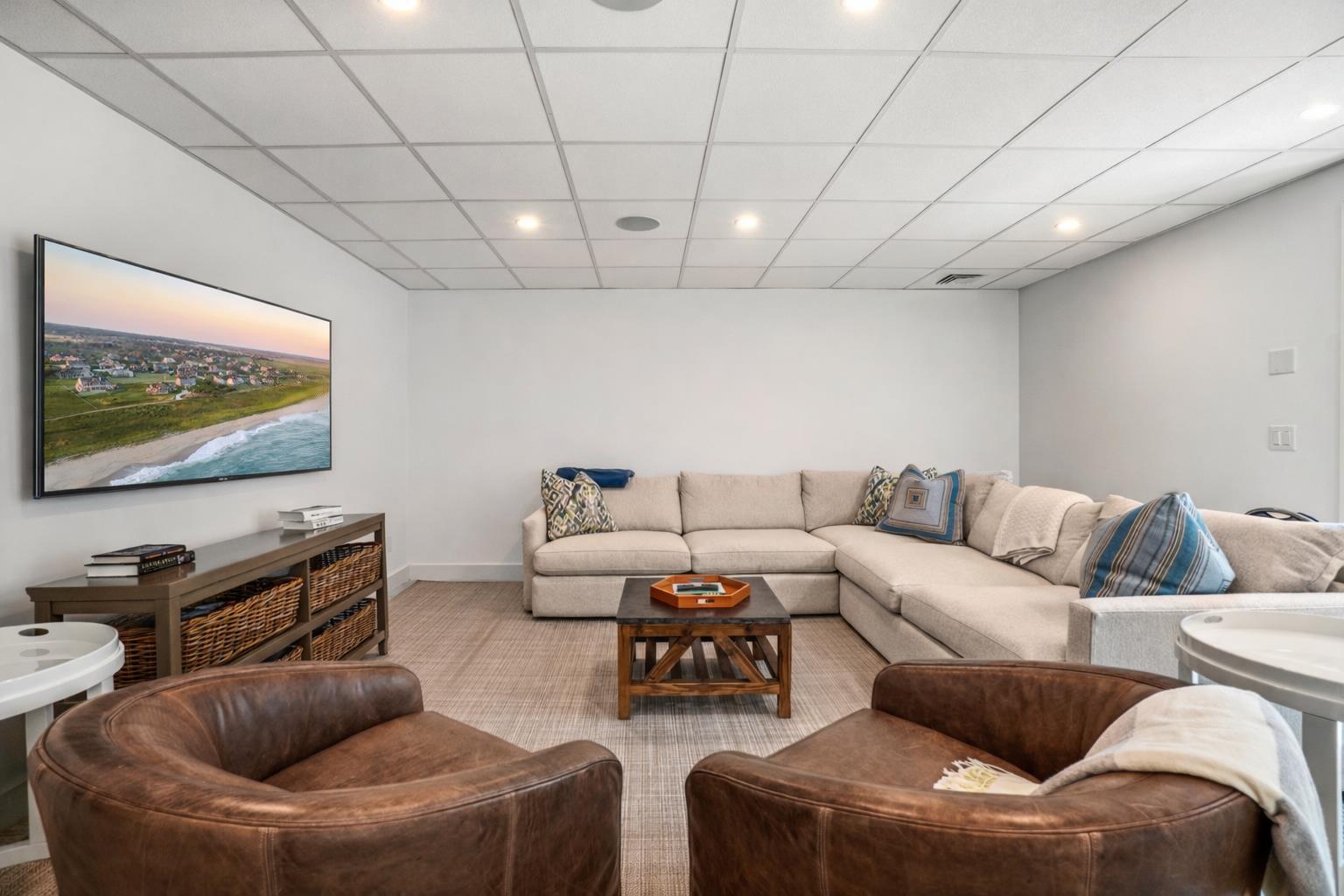 2 Marion Avenue Nantucket, MA 02554 - Photo 32 of 43 a living room with furniture and a flat screen tv