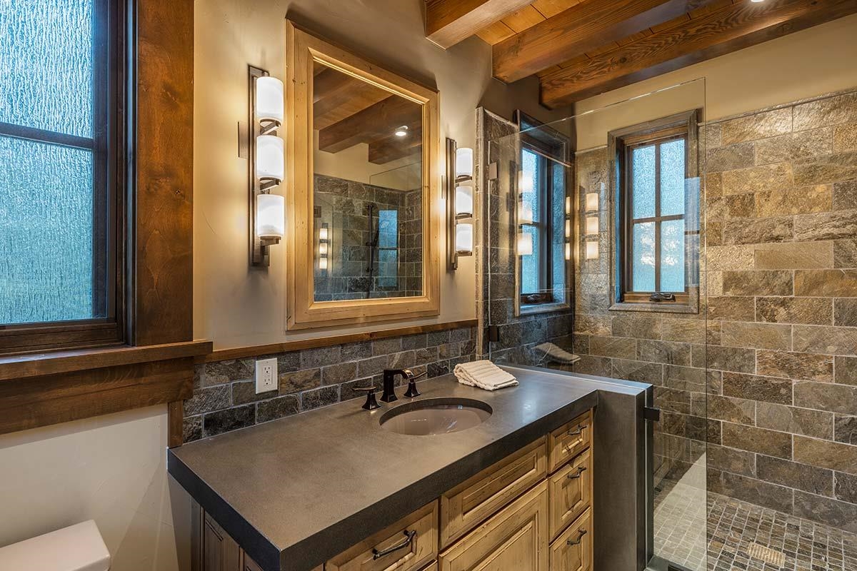 10285 Olana Drive Truckee, CA 96161 - Photo 15 of 21 a bathroom with a sink vanity and a mirror
