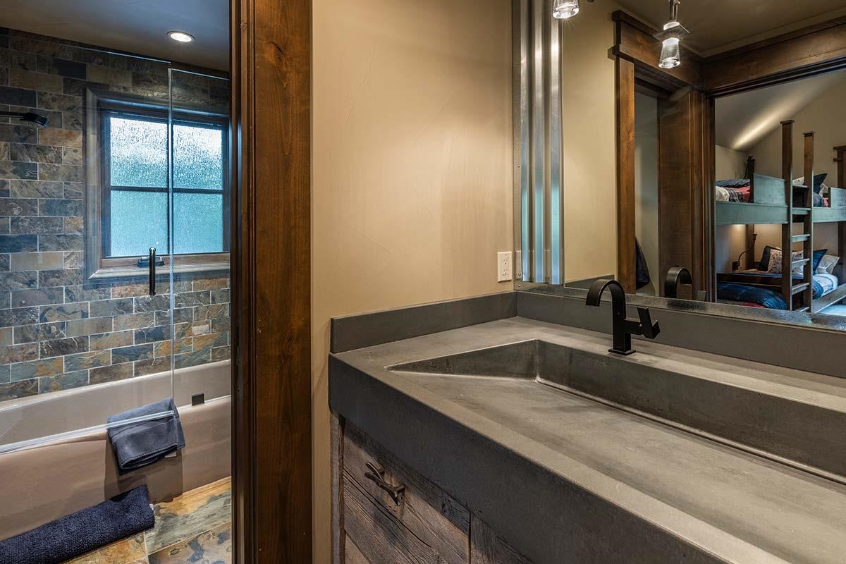 10285 Olana Drive Truckee, CA 96161 - Photo 18 of 21 a bathroom with a sink and a mirror