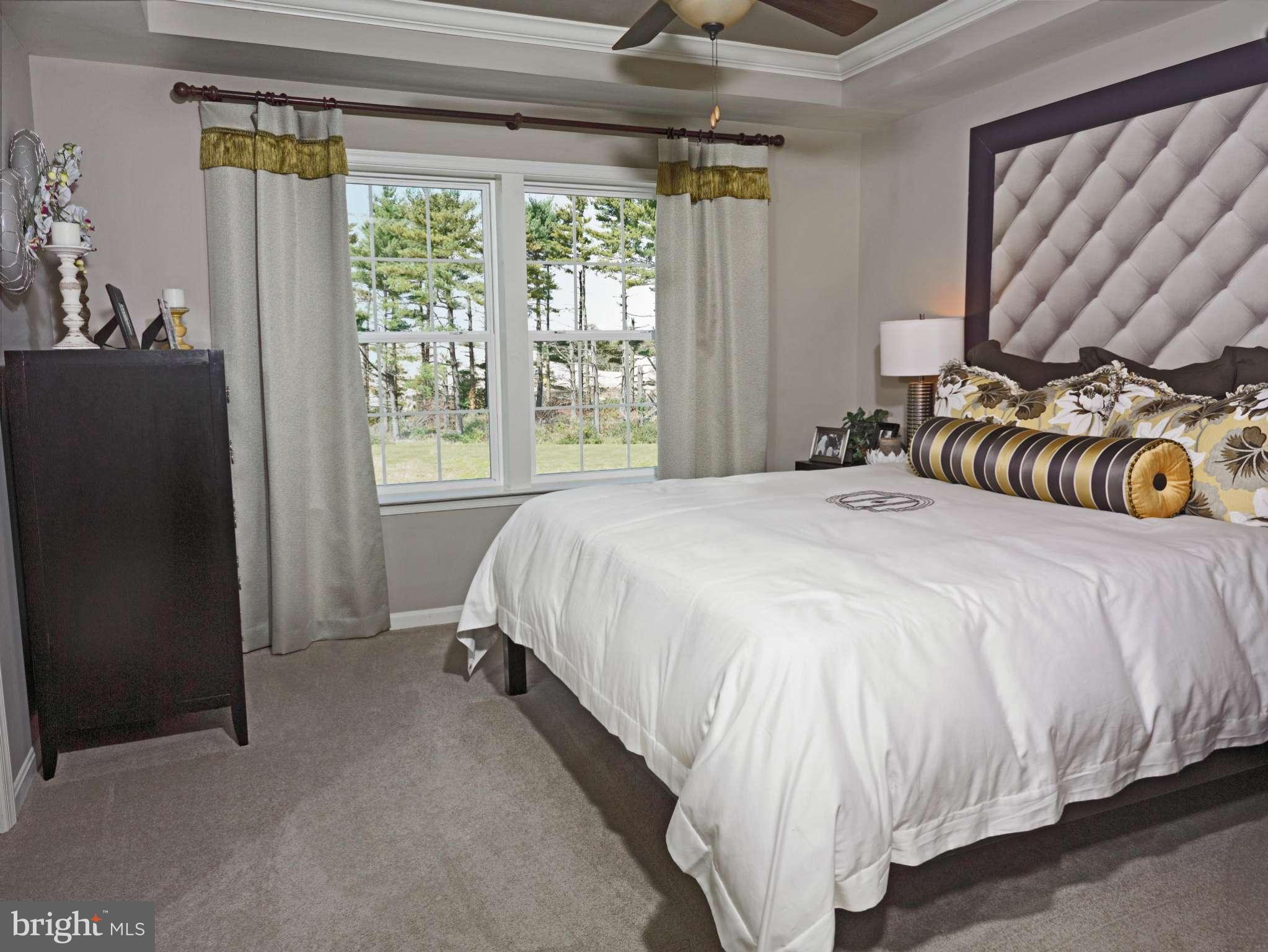 701 Holden Road Frederick, MD 21701 - Photo 6 of 6 a spacious bedroom with a bed and a window