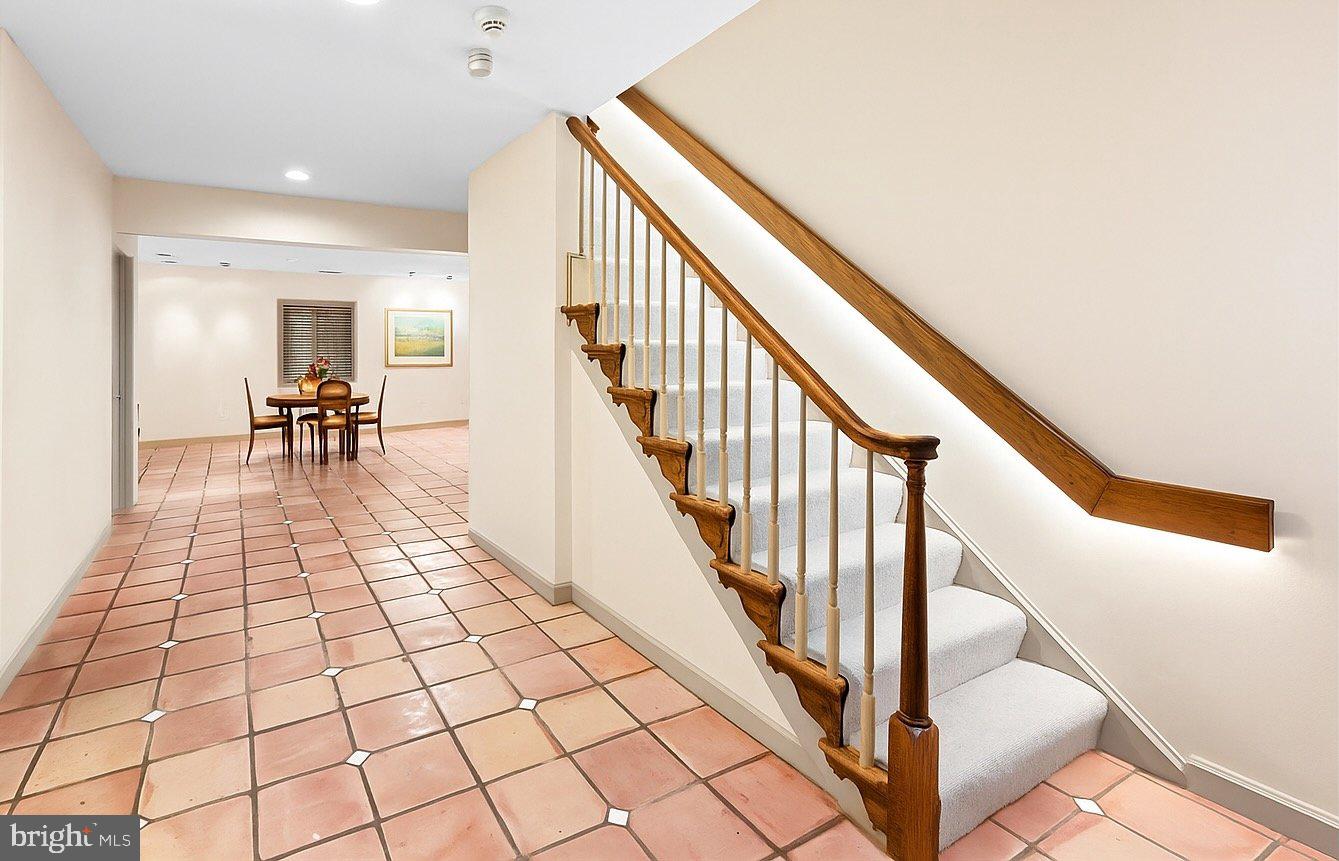 4616 Foxhall Crescent Northwest Washington, DC 20007 - Photo 15 of 21 a view of an empty room and staircase