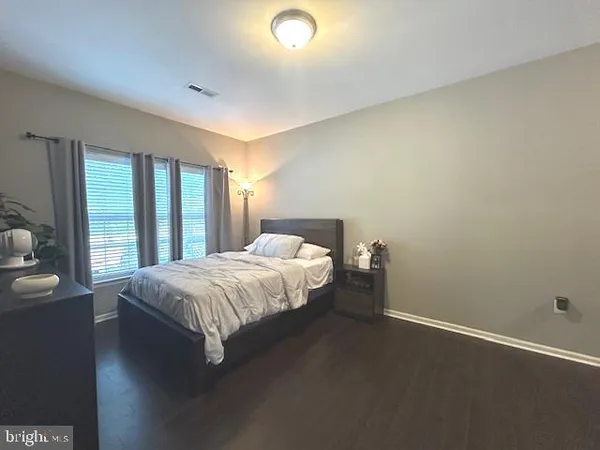 a room with a sink cabinets and utility room
