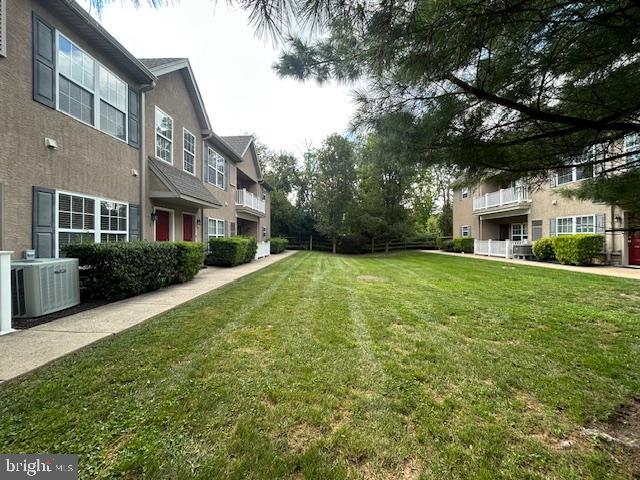 13675 Philmont Avenue, Unit 7 Philadelphia, PA 19116 - Photo 45 of 47 a view of house with yard and green space