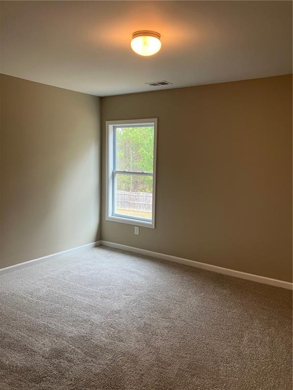2808 Brookford Lane Southwest Atlanta, GA 30331 - Photo 16 of 25 an empty room with a window