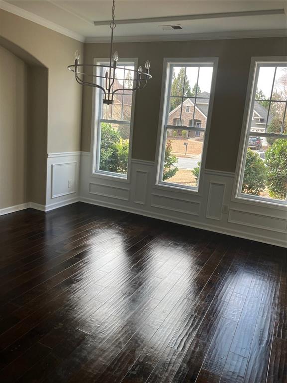 2808 Brookford Lane Southwest Atlanta, GA 30331 - Photo 3 of 25 a view of room with wooden floor and windows