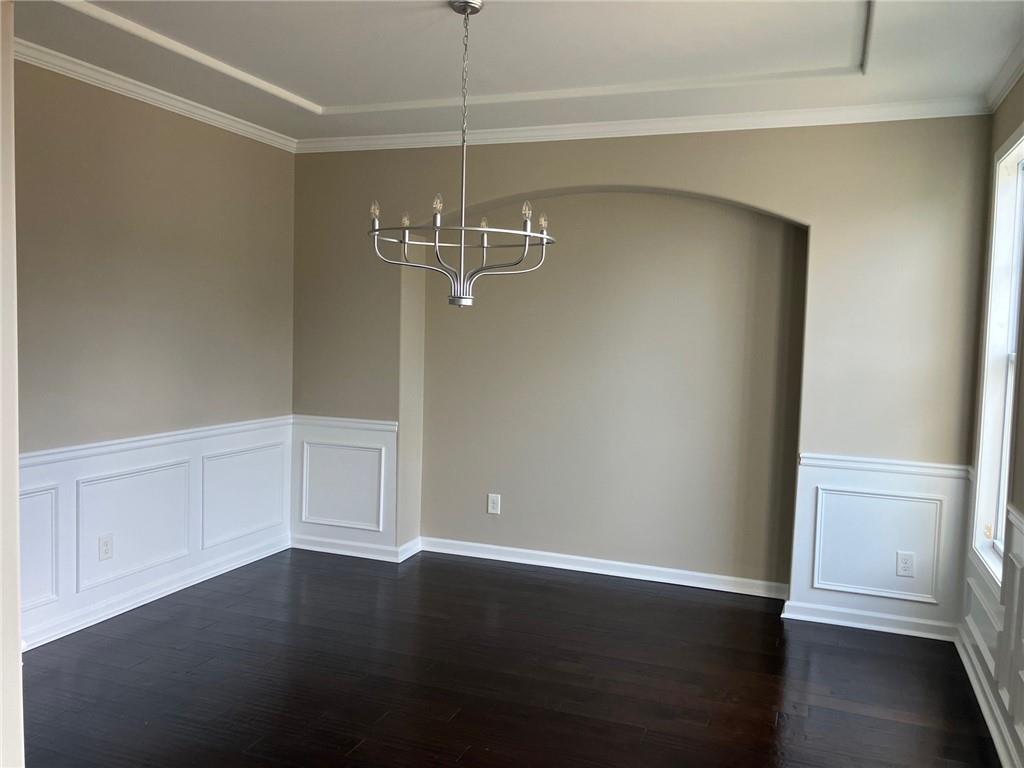 2808 Brookford Lane Southwest Atlanta, GA 30331 - Photo 4 of 25 an empty room with wooden floor closet and windows