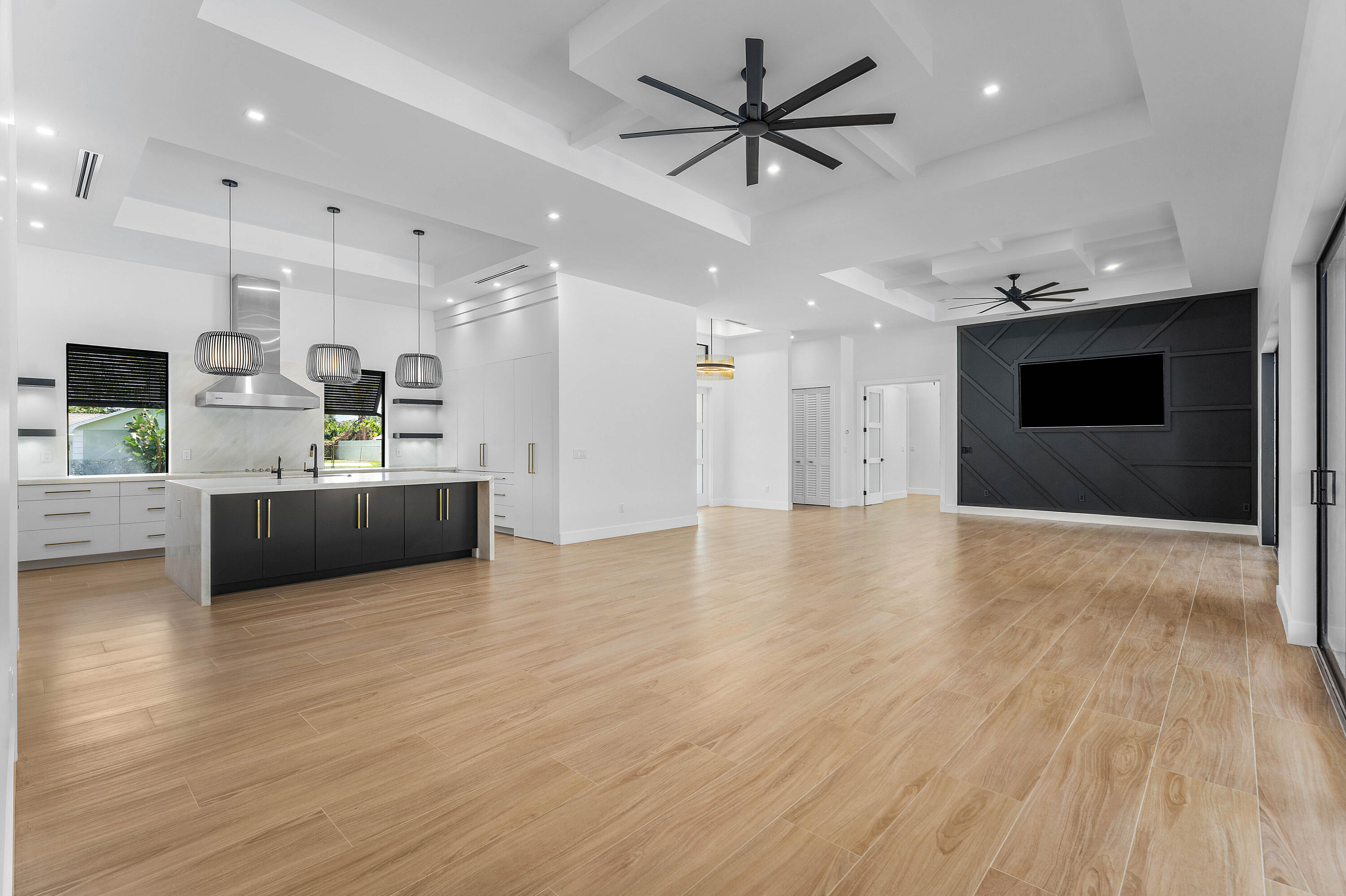 5701 Old Orange Road Jupiter, FL 33458 - Photo 9 of 46 a view of a kitchen with a sink and a microwave