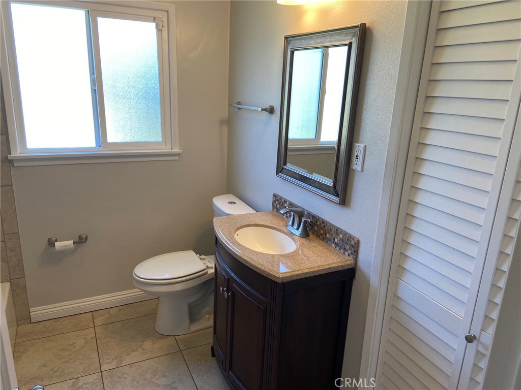 3603 148th Place Hawthorne, CA 90250 - Photo 11 of 19 a bathroom with a sink and a toilet