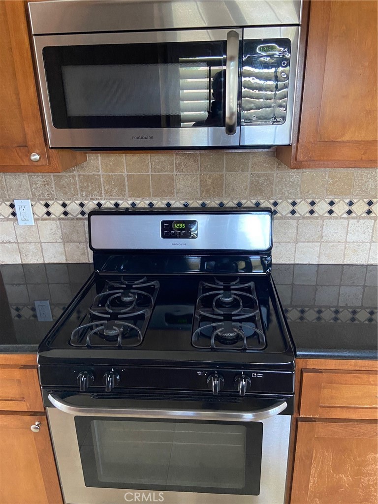 3603 148th Place Hawthorne, CA 90250 - Photo 8 of 19 a stove top oven sitting inside of a kitchen