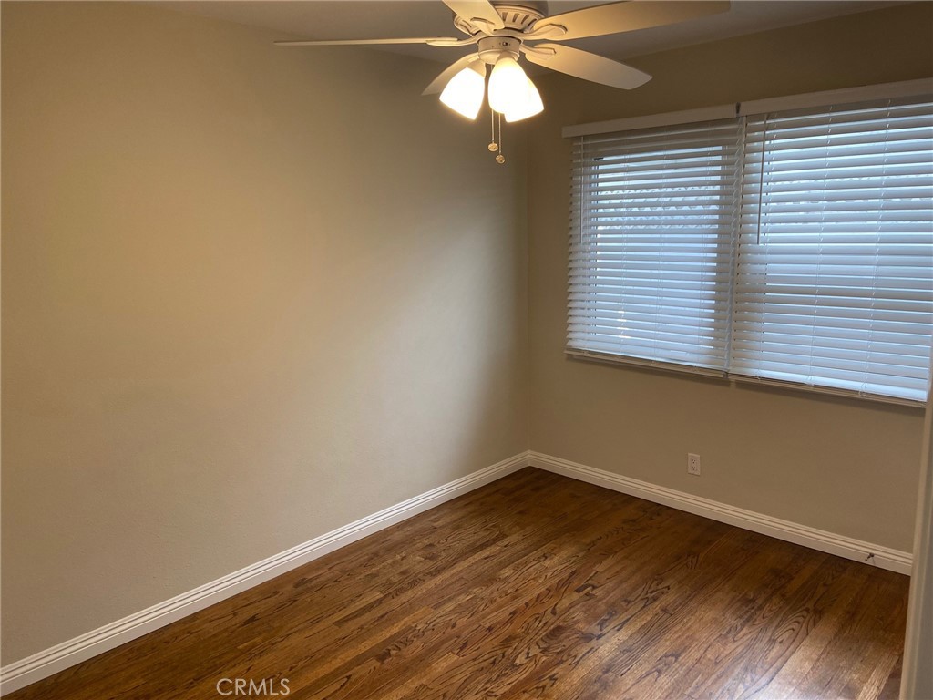 3603 148th Place Hawthorne, CA 90250 - Photo 10 of 19 an empty room with wooden floor and windows