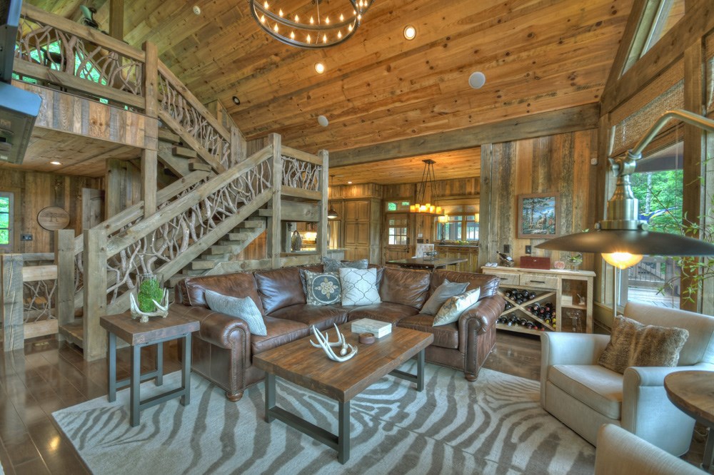 436 Geronimo Road Cherry Log, GA 30522 - Photo 11 of 72 a living room with furniture and a chandelier