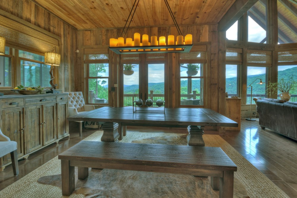 436 Geronimo Road Cherry Log, GA 30522 - Photo 13 of 72 a view of a dining room with furniture a chandelier and wooden floor