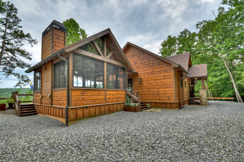 436 Geronimo Road Cherry Log, GA 30522 - Photo 24 of 72 a view of a house with a yard