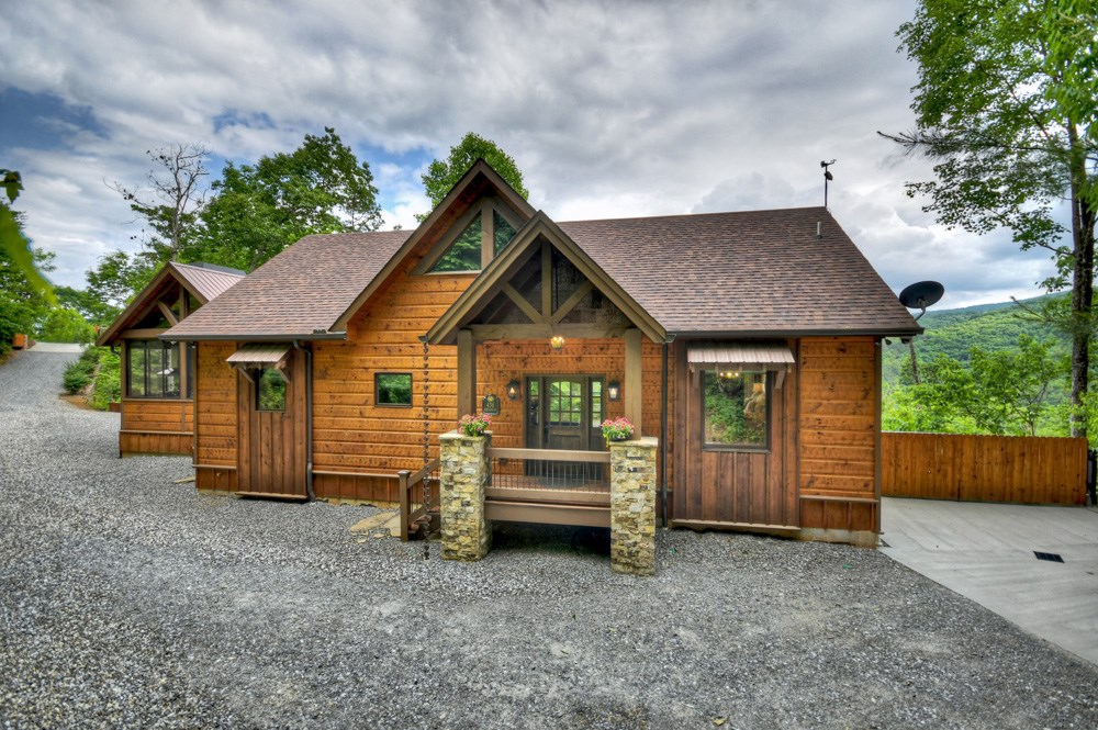 436 Geronimo Road Cherry Log, GA 30522 - Photo 3 of 72 a view of a house with a yard