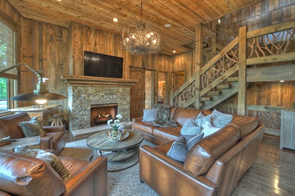 436 Geronimo Road Cherry Log, GA 30522 - Photo 42 of 72 a living room with furniture and a fireplace