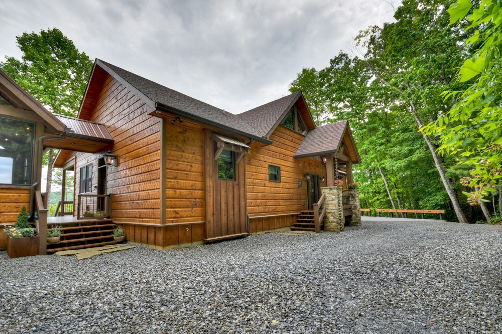 436 Geronimo Road Cherry Log, GA 30522 - Photo 68 of 72 a view of a house with a backyard and chair