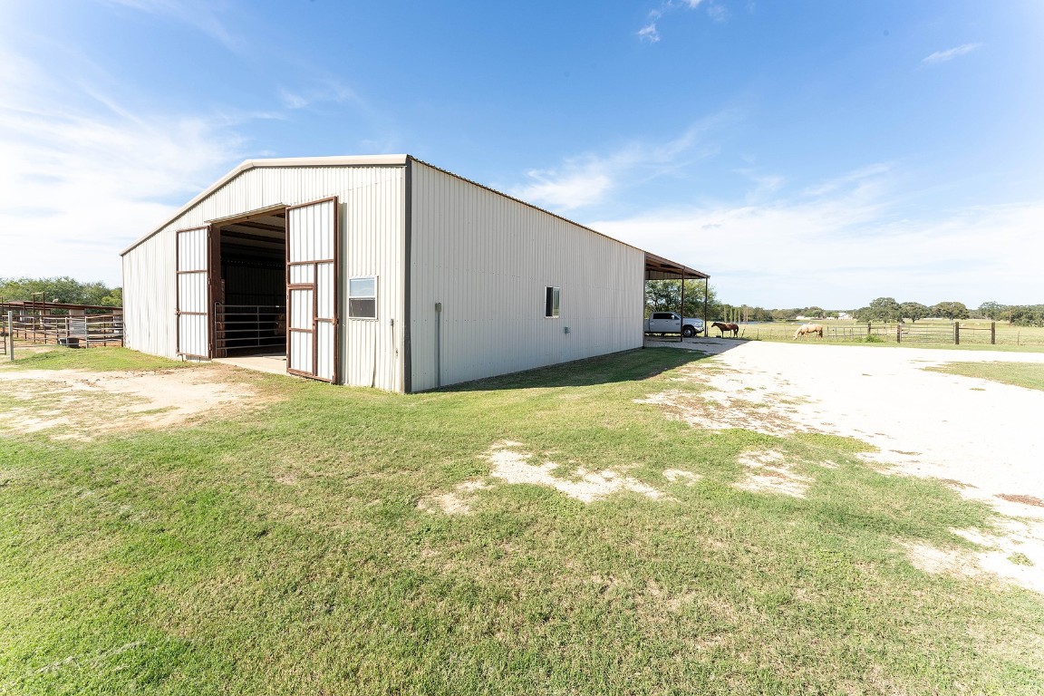 2542 Witter Road Lockhart, TX 78644 - Photo 15 of 40 a view of a big room with closet and a yard