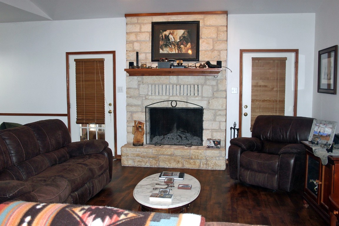 2542 Witter Road Lockhart, TX 78644 - Photo 17 of 40 a living room with furniture and a fireplace