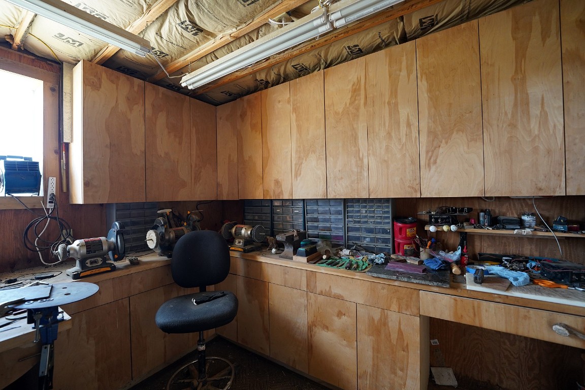 2542 Witter Road Lockhart, TX 78644 - Photo 33 of 40 a kitchen with a sink and cabinets