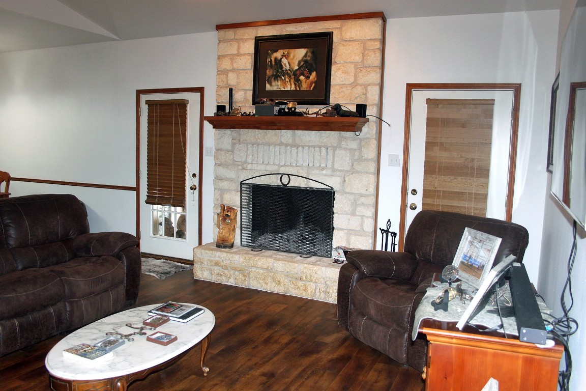 2542 Witter Road Lockhart, TX 78644 - Photo 4 of 40 a living room with furniture and a fireplace