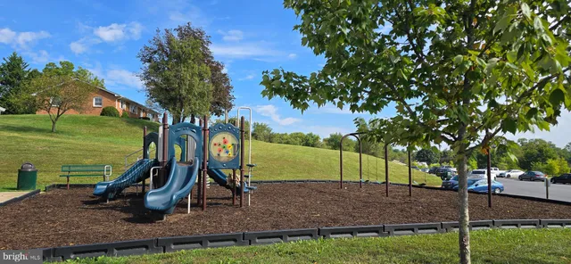 a view of an chair and tables in the patio
