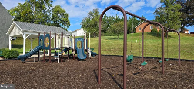 an aerial view of a house with outdoor space