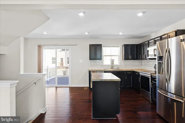 a view of livingroom with furniture and wooden floor