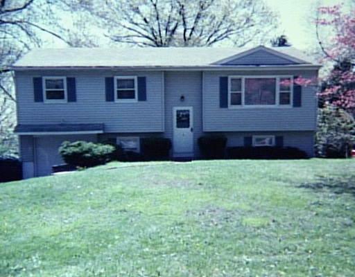 1 Marldon Road Danbury, CT 06804 - Photo 1 of 1 a front view of a house with a garden