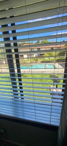 a view of a garage with parked cars