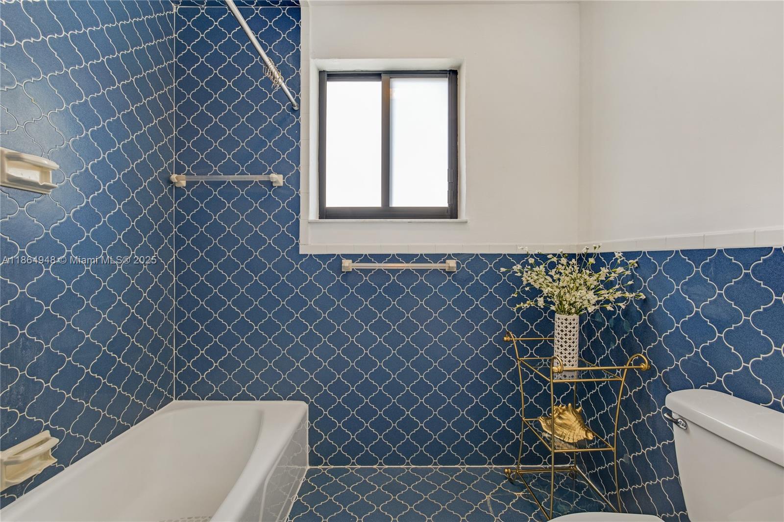 2022 Southwest 82nd Court, Unit B Miami, FL 33155 - Photo 5 of 15 a bathroom with a toilet and a sink